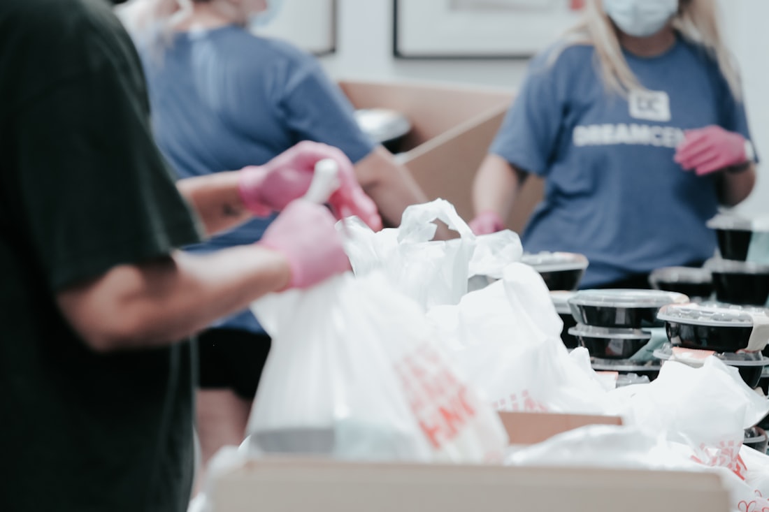 Volunteers preparing meals for the community